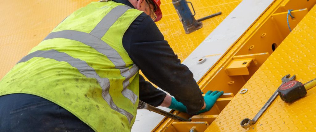 engineer fixing weighbridge